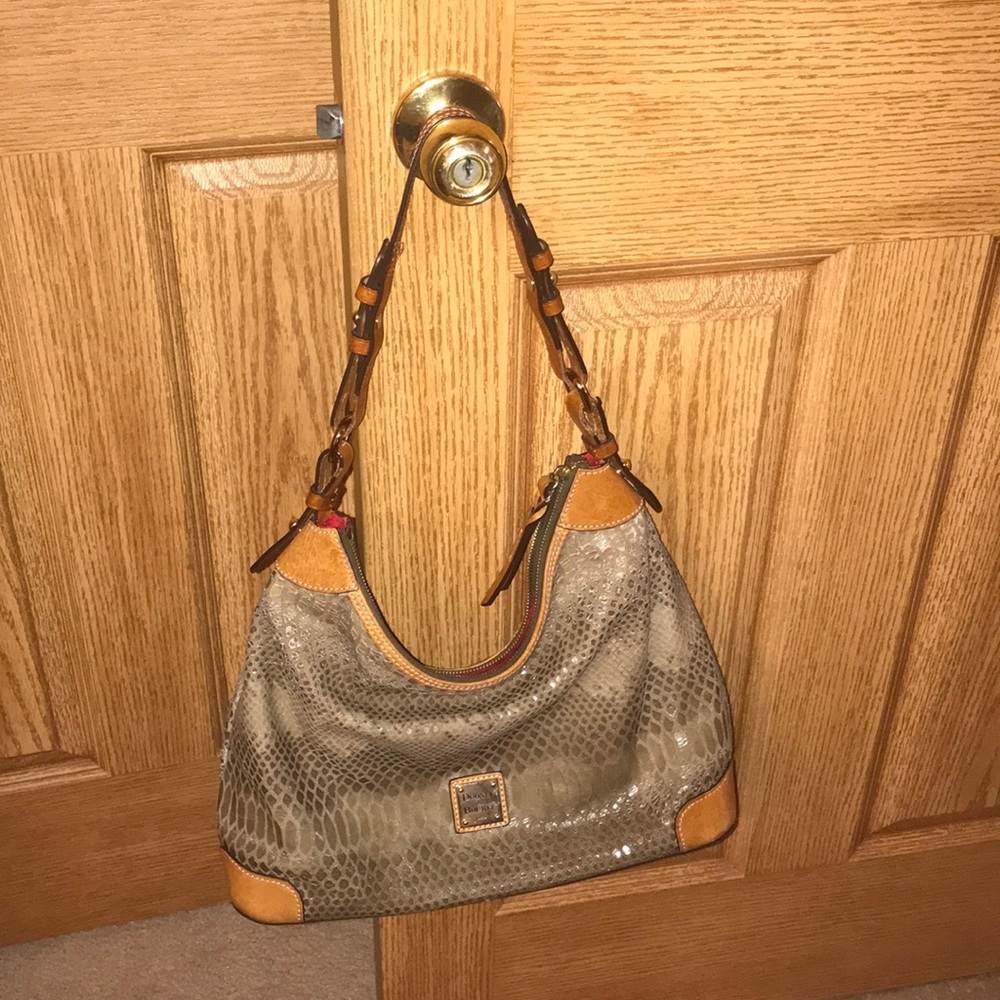 Dooney and Burke bag with back zipper.